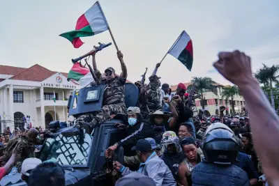 Madagascar’s president flees after soldiers turned against him, opposition lawmaker says