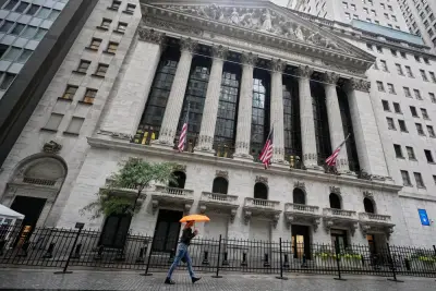 Wall Street recovers some of Friday’s sell-off after Trump softens his criticism of China