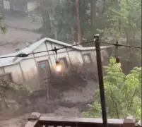 New Mexico flash flooding kills 3 in a mountain village
