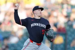 Zebby Matthews throws live batting practice for Twins